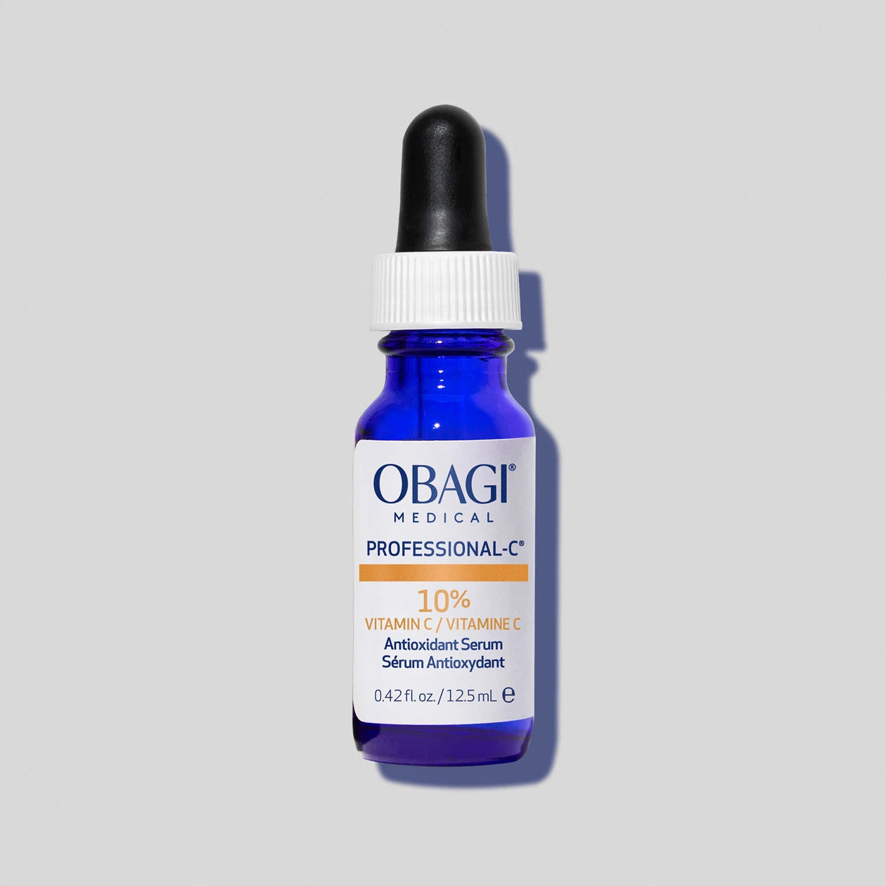 Professional-C Serum 10% travel size bottle on grey background