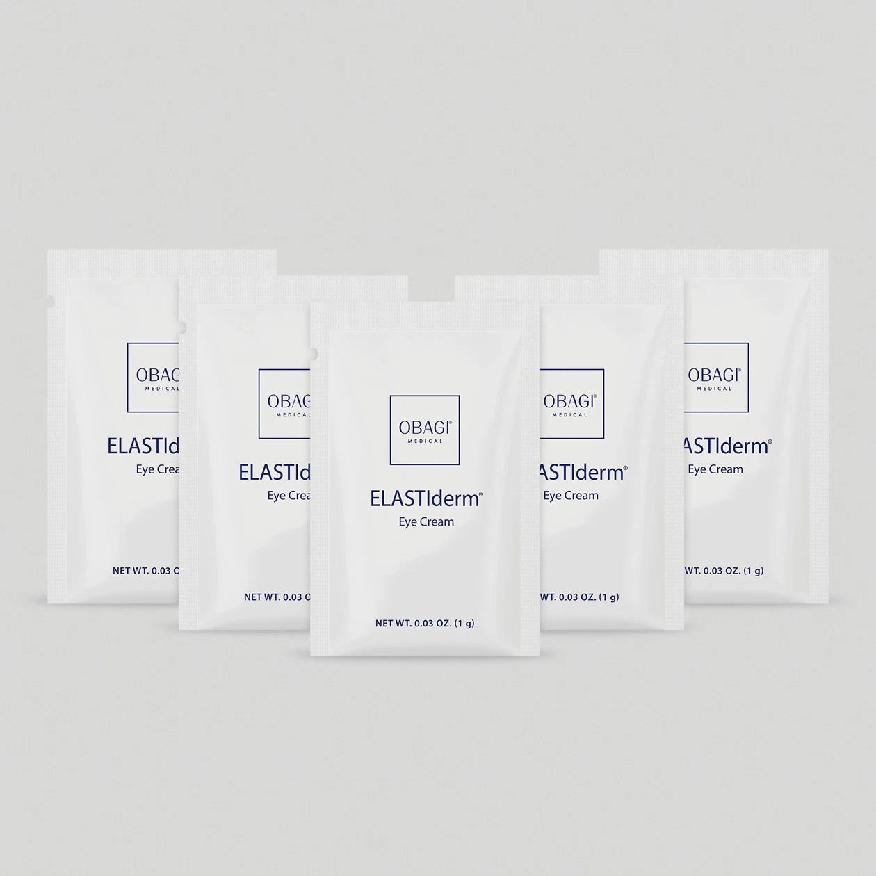 Multiple packages of OBAGI ELASTIderm Eye Cream on a white background