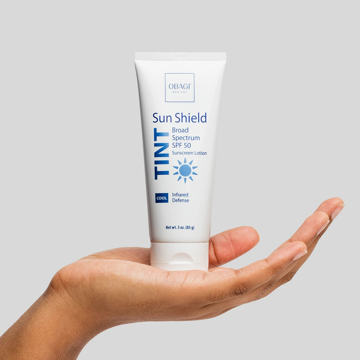 Sun Shield Tint Broad Spectrum SPF 50 Cool Product in Model Hand